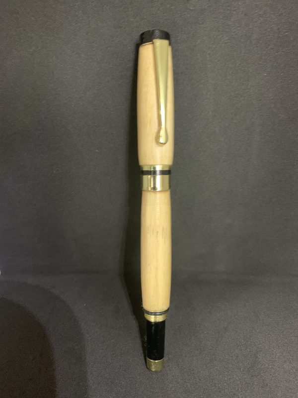 Handcrafted fountain pen in British Willow wood finished in gold fittings